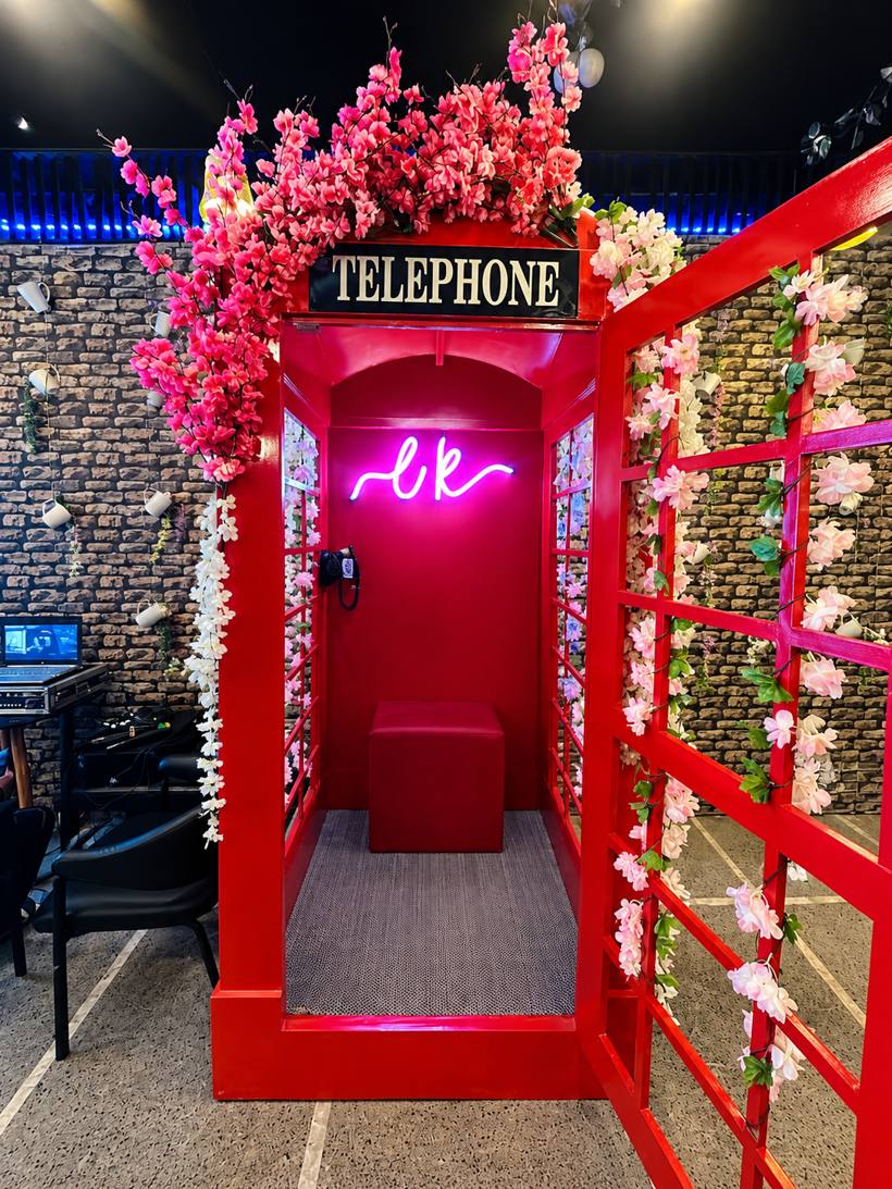 Red telephone booth photo corner
